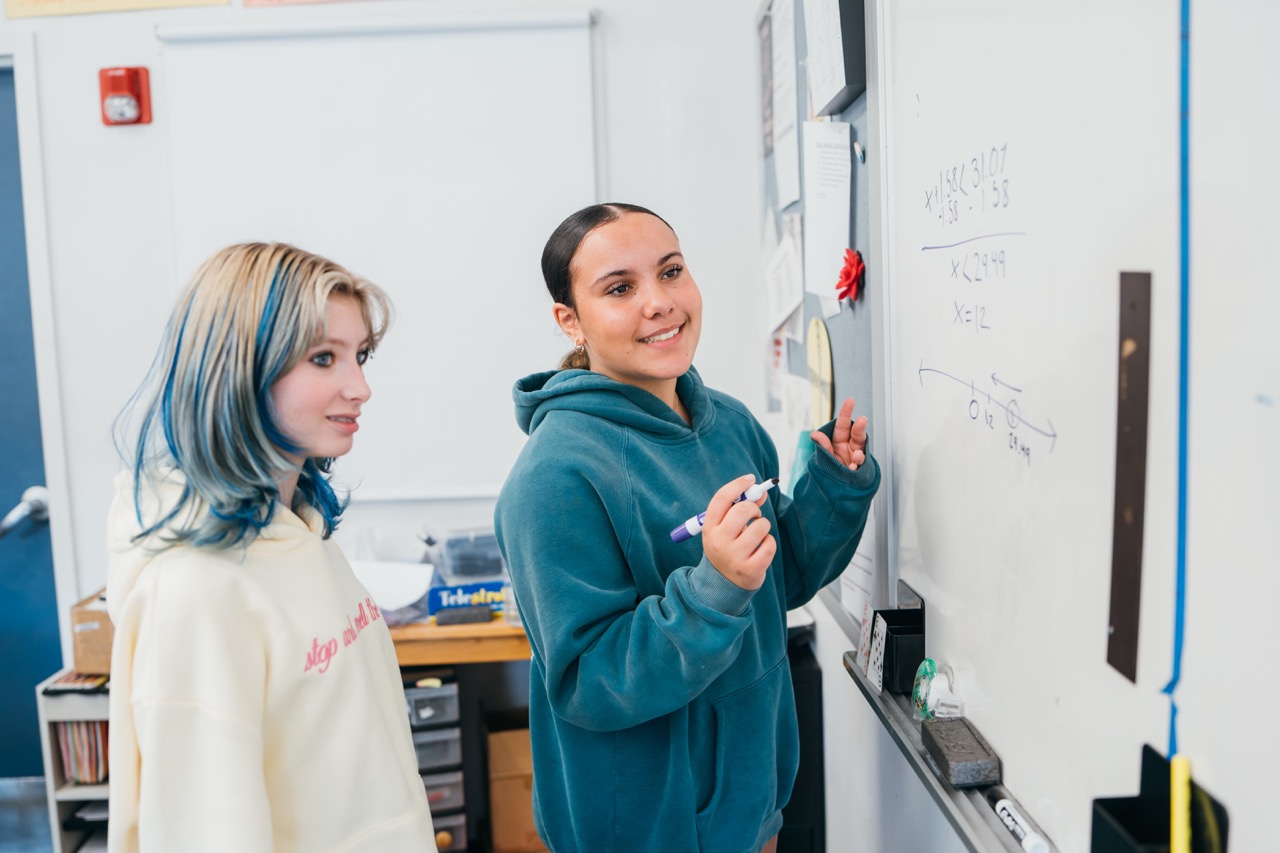 students at whiteboard